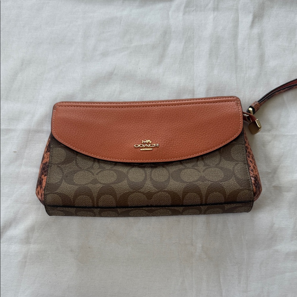 Coach Brown and Tan Clutch with Orange Accents